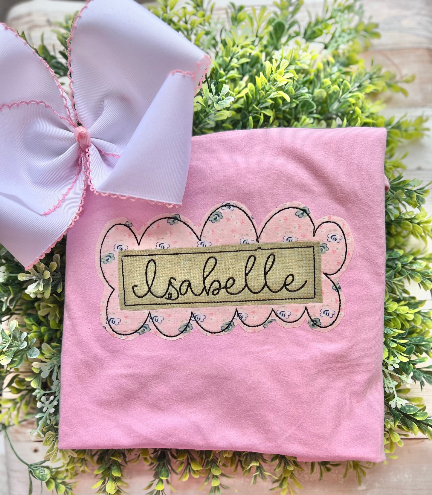 Scalloped nameplate